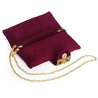 Maroon clutch bag named Stylish Classic Envelope Clutch, featuring faux emerald detailing and soft fabric texture | Peora
