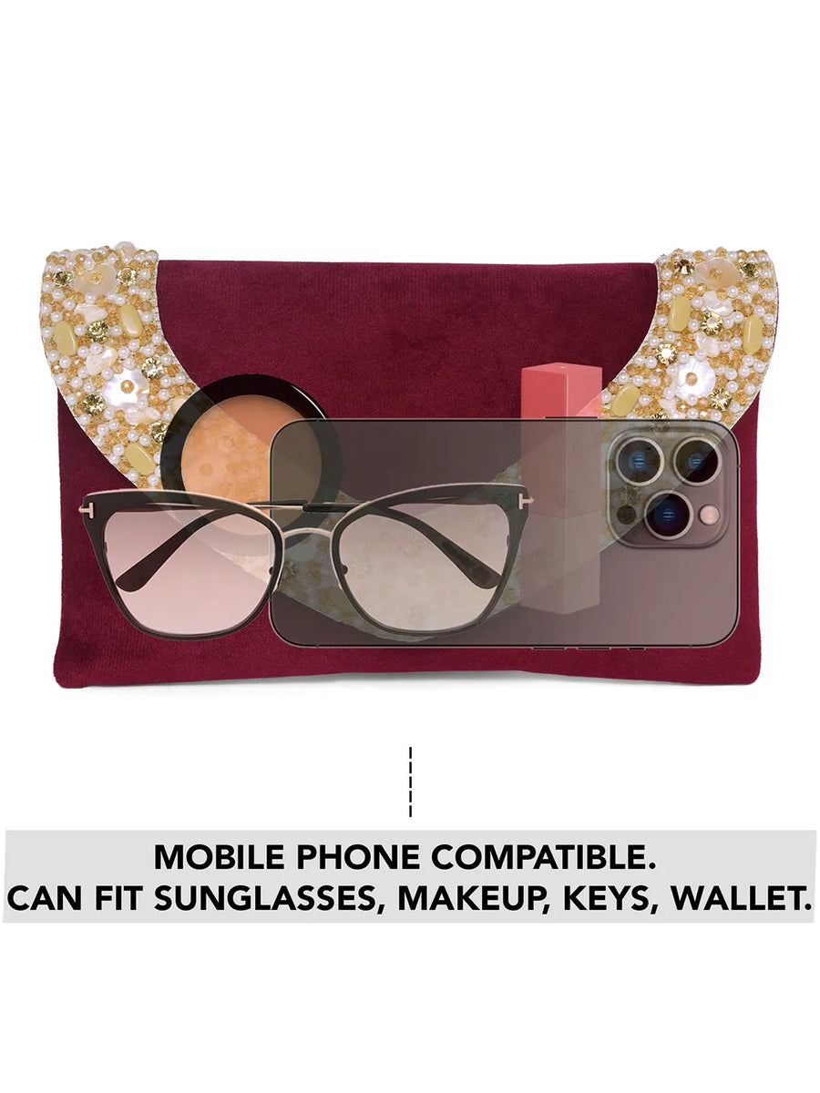 Brown clutch bag named Gilded Glamour Evening Hand Clutch, featuring artificial beads detailing and soft fabric texture | Peora
