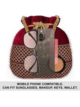 Maroon potli bag named Pearl Trim Zari Bead Potli Bag, featuring artificial beads detailing and soft fabric texture | Peora
