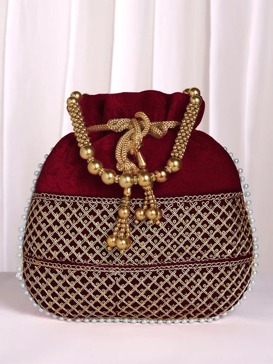 Maroon potli bag named Pearl Trim Zari Bead Potli Bag, featuring artificial beads detailing and soft fabric texture | Peora

