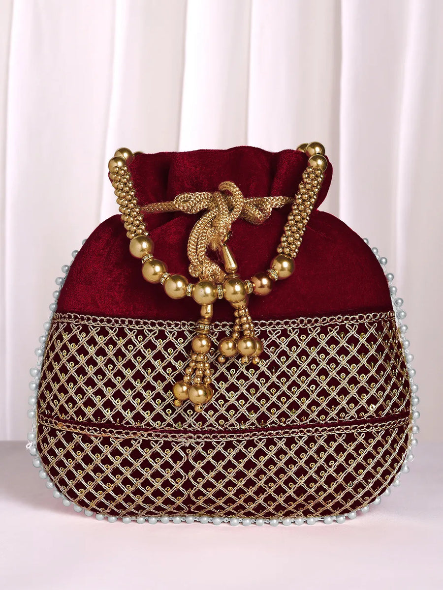 Maroon potli bag named Pearl Trim Zari Bead Potli Bag, featuring artificial beads detailing and soft fabric texture | Peora
