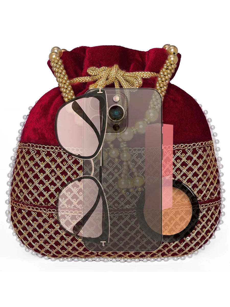 Maroon potli bag named Pearl Trim Zari Bead Potli Bag, featuring artificial beads detailing and soft fabric texture | Peora
