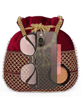 Maroon potli bag named Pearl Trim Zari Bead Potli Bag, featuring artificial beads detailing and soft fabric texture | Peora

