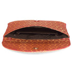 Maroon clutch bag named Twilight Gleam Foldover Clutch, featuring pearl detailing and soft fabric texture | Peora
