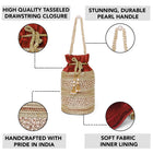 Maroon potli bag named Sequin & Pearl Embellished Potli Bag, featuring faux pearl detailing and soft fabric texture | Peora
