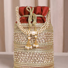 Maroon potli bag named Sequin & Pearl Embellished Potli Bag, featuring faux pearl detailing and soft fabric texture | Peora
