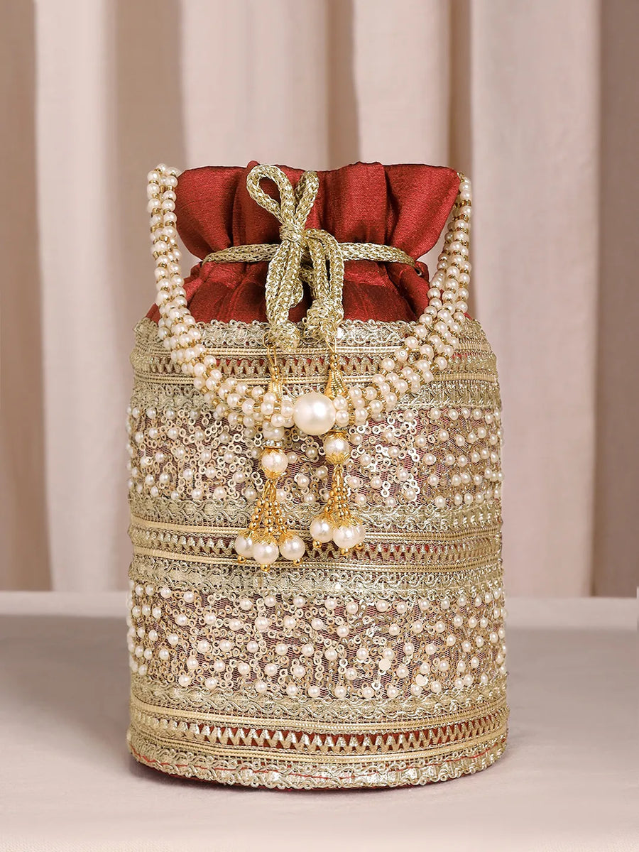 Maroon potli bag named Sequin & Pearl Embellished Potli Bag, featuring faux pearl detailing and soft fabric texture | Peora
