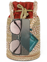 Maroon potli bag named Sequin & Pearl Embellished Potli Bag, featuring faux pearl detailing and soft fabric texture | Peora
