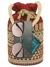 Maroon potli bag named Ethnic Floral Potli with sequins Mofit, featuring artificial beads detailing and soft fabric texture | Peora
