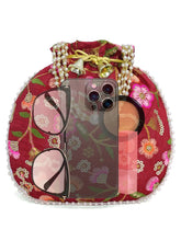 Maroon potli bag named Hand Embroidered Floral Potli Bag, featuring artificial beads detailing and soft fabric texture | Peora