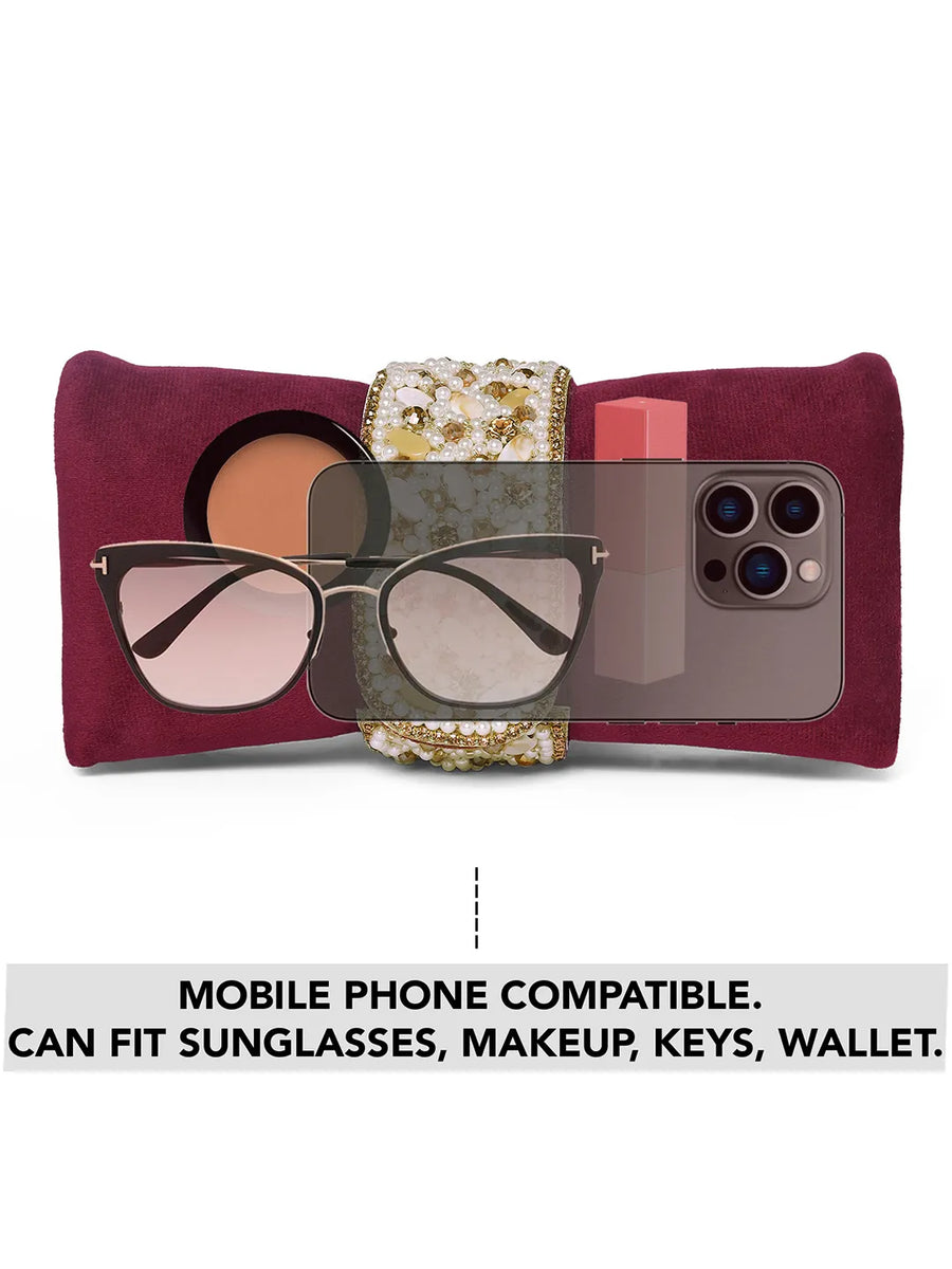 Maroon clutch bag named Clutch Bags Crafted for Elegance, featuring pearl detailing and soft fabric texture | Peora
