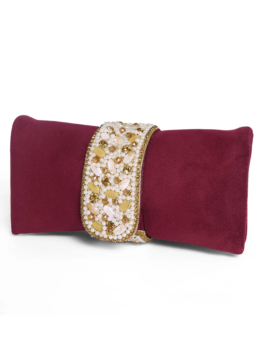 Maroon clutch bag named Clutch Bags Crafted for Elegance, featuring pearl detailing and soft fabric texture | Peora
