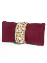 Maroon clutch bag named Clutch Bags Crafted for Elegance, featuring pearl detailing and soft fabric texture | Peora
