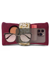Maroon clutch bag named Clutch Bags Crafted for Elegance, featuring pearl detailing and soft fabric texture | Peora
