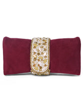 Maroon clutch bag named Clutch Bags Crafted for Elegance, featuring pearl detailing and soft fabric texture | Peora
