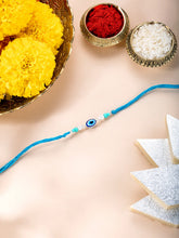 Close-up of Minimalist Evil Eye Silver Thread featuring sky blue thread, beads work, and rhodium plating – ideal for Raksha Bandhan | Peora
