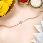 Close-up of Pure Silver Om Rakhi for Brother featuring silver thread, beads work, and rhodium plating – ideal for Raksha Bandhan | Peora
