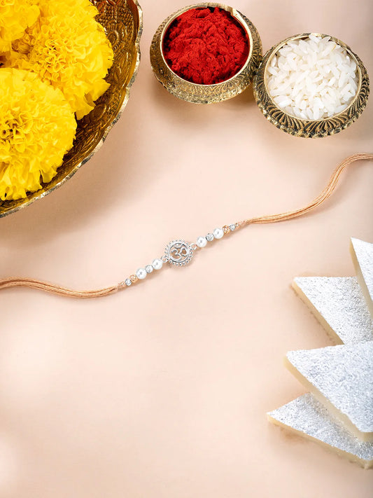 Close-up of Pure Silver Om Rakhi for Brother featuring silver thread, beads work, and rhodium plating – ideal for Raksha Bandhan | Peora
