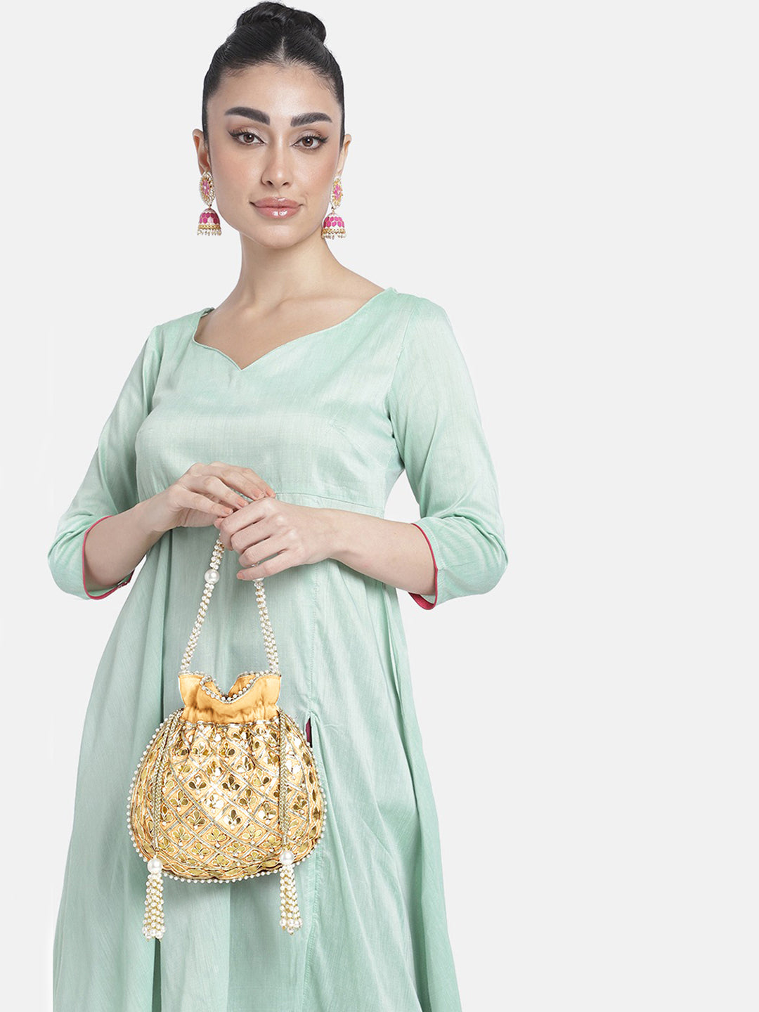 Gather the Glam Cream Colour Potli Bag