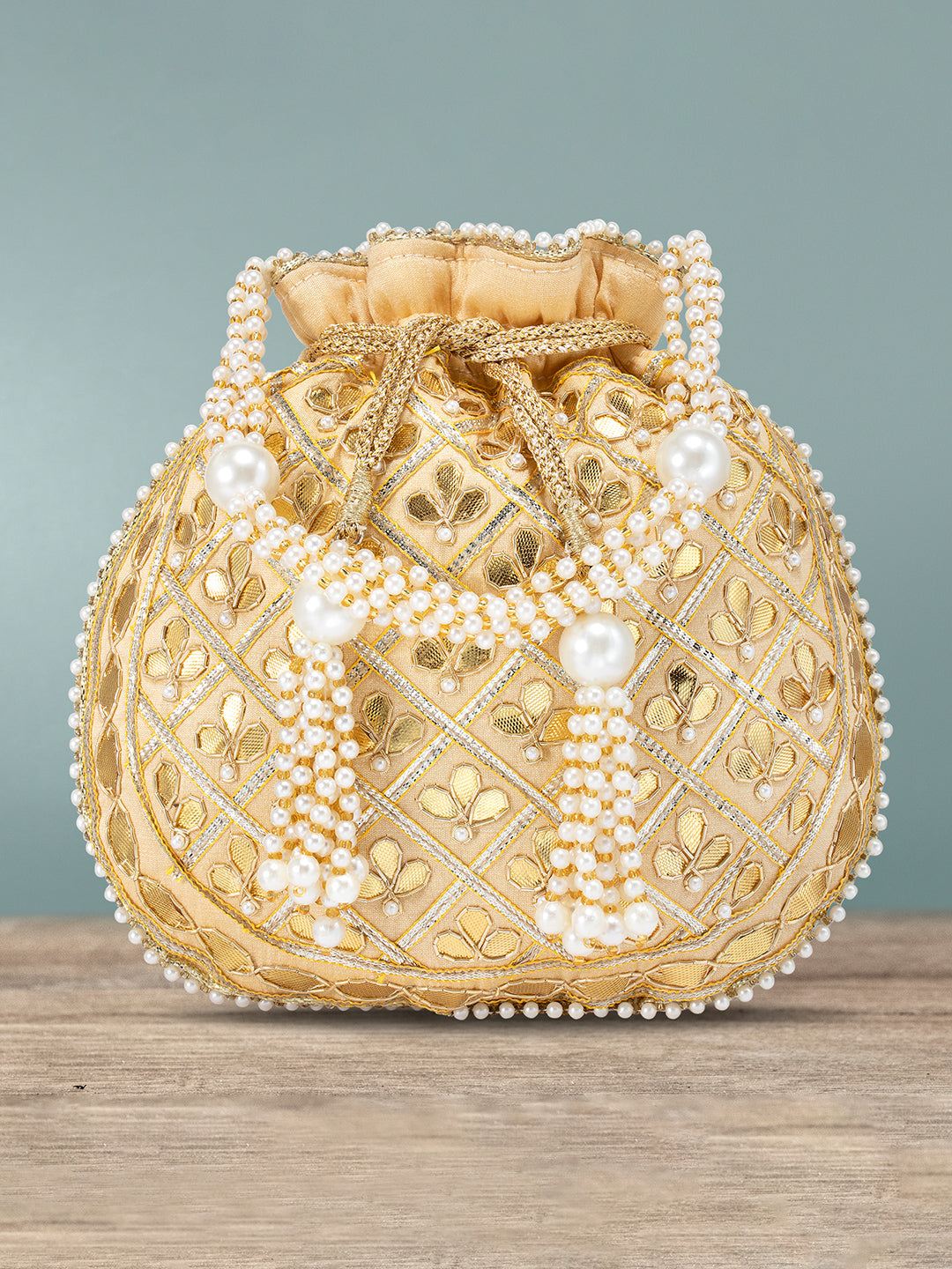 Gather the Glam Cream Colour Potli Bag