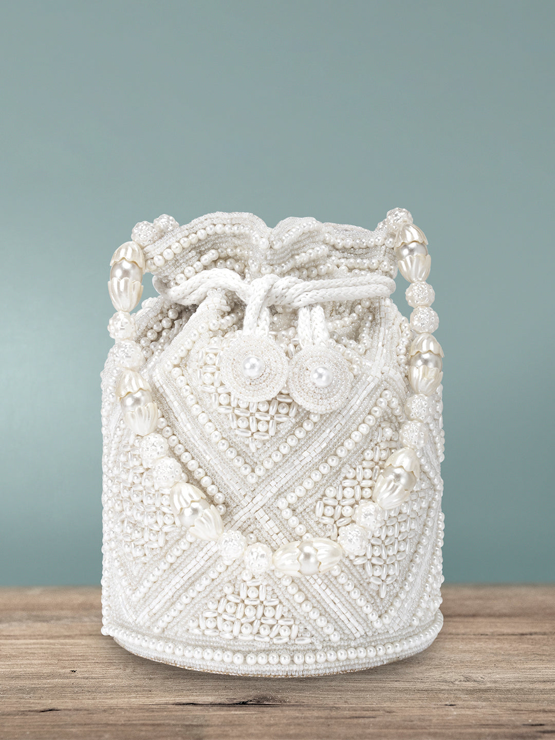 Lustrous Carry Pearl & Stones White Potli Bag