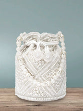 Lustrous Carry Pearl & Stones Potli Bag