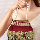 Timeless Zari Embroidery Potli Bag - Maroon