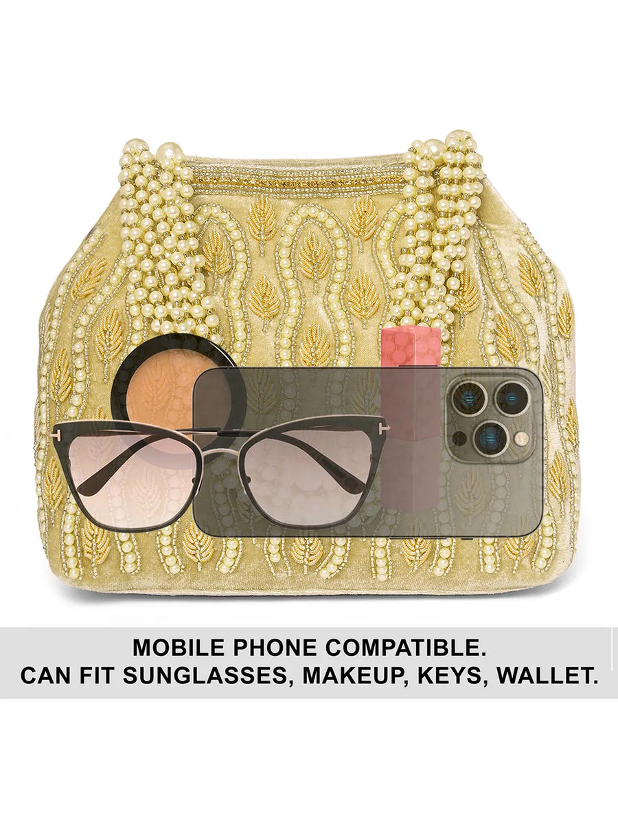 Gold potli bag named Embroidered Beaded Potli Purse, featuring faux pearl detailing and soft fabric texture | Peora
