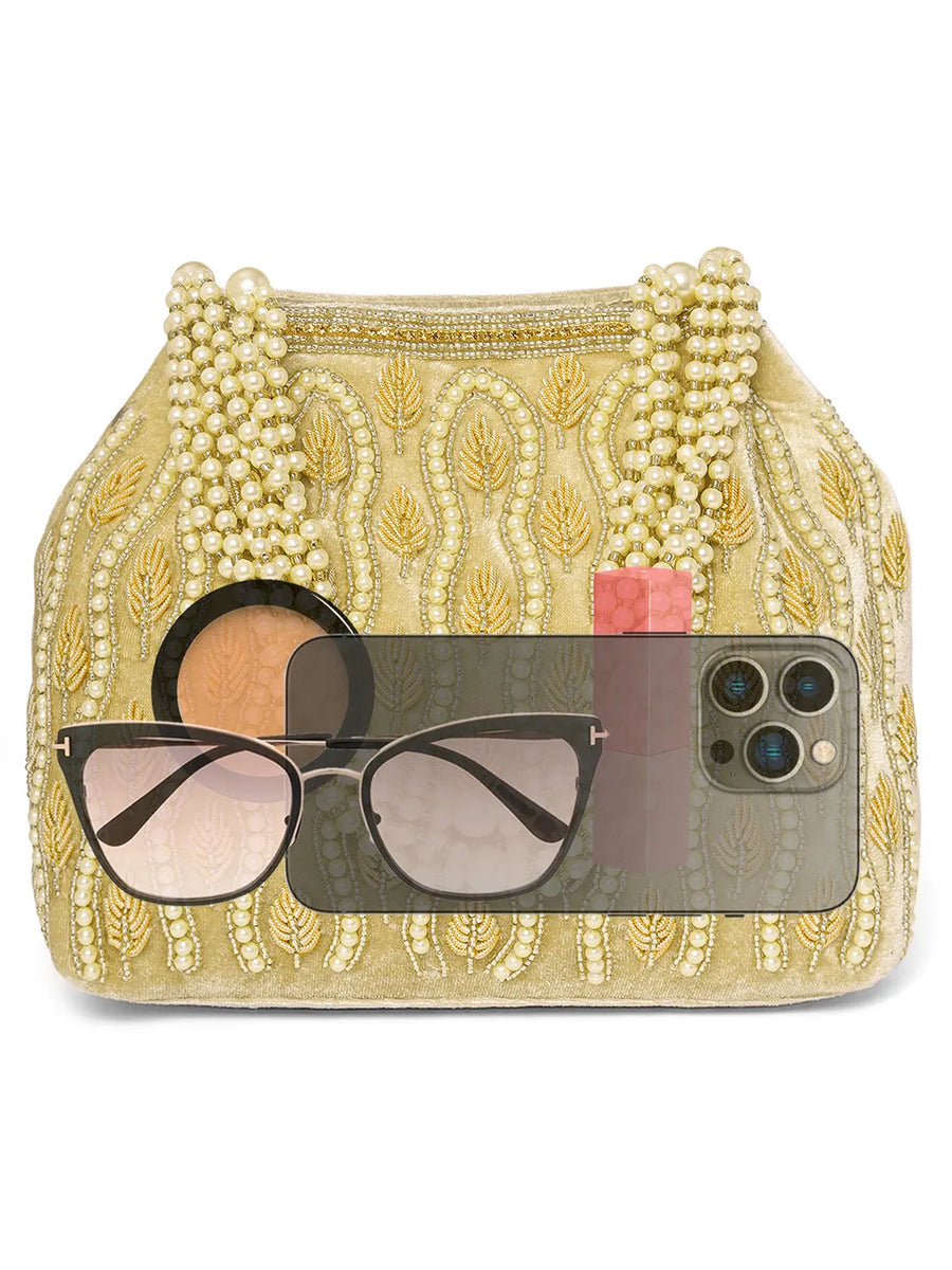 Gold potli bag named Embroidered Beaded Potli Purse, featuring faux pearl detailing and soft fabric texture | Peora
