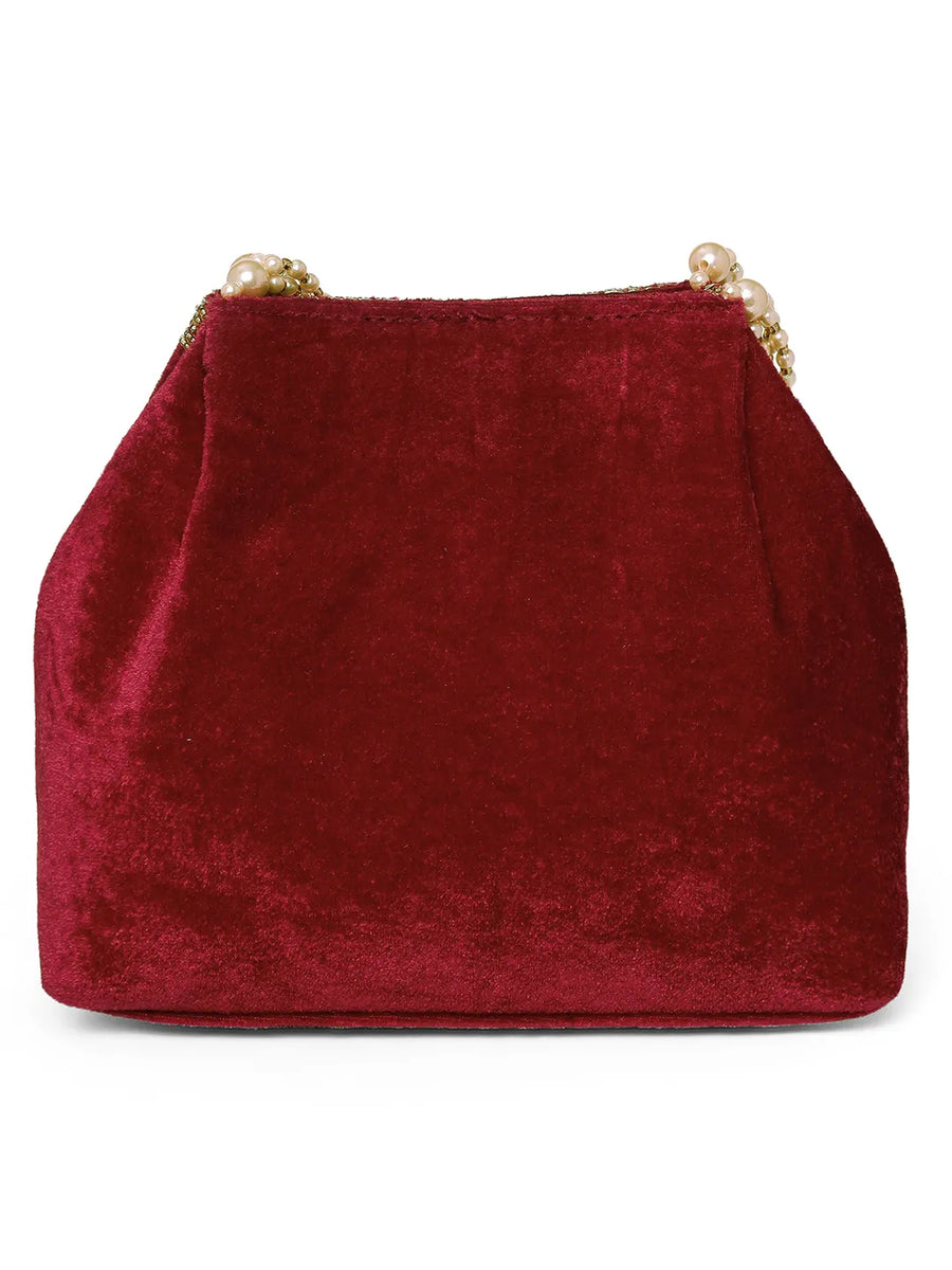 Maroon potli bag named Embroidered Beaded Potli Purse, featuring faux pearl detailing and soft fabric texture | Peora
