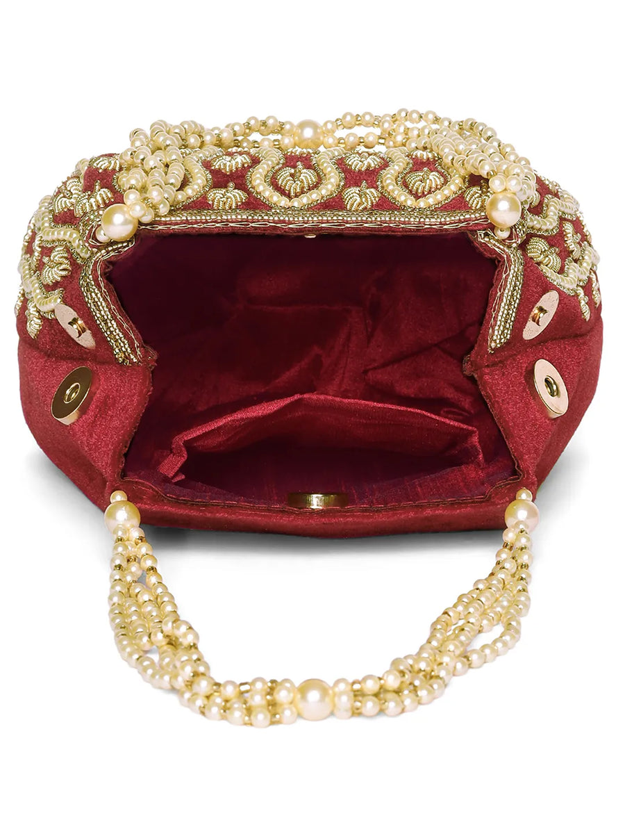Maroon potli bag named Embroidered Beaded Potli Purse, featuring faux pearl detailing and soft fabric texture | Peora
