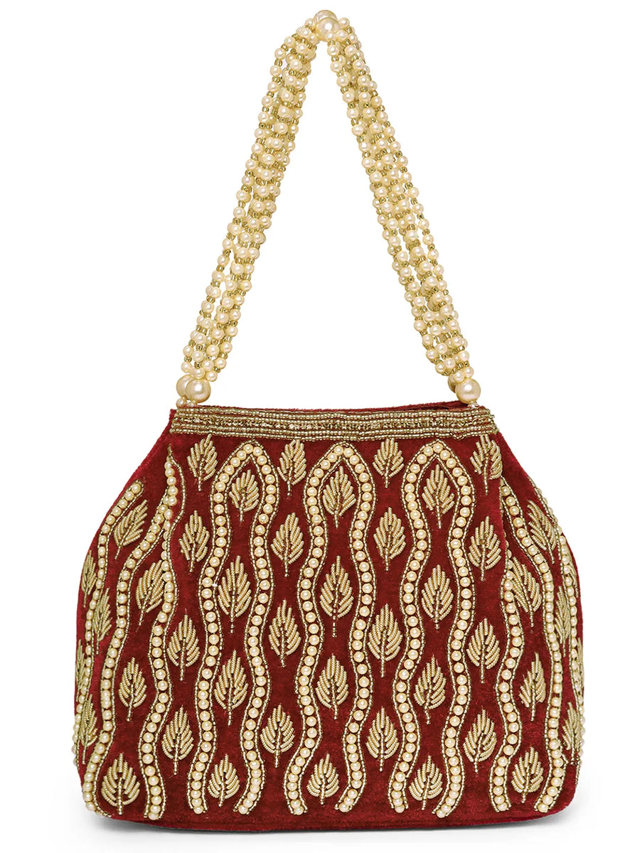 Maroon potli bag named Embroidered Beaded Potli Purse, featuring faux pearl detailing and soft fabric texture | Peora
