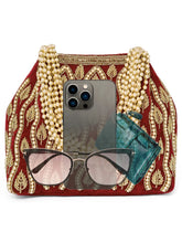 Maroon potli bag named Embroidered Beaded Potli Purse, featuring faux pearl detailing and soft fabric texture | Peora
