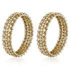 Festive Finish Faux Kundan Pair. Pair of Bangles with Champagne colour kundan stones along with pearls on the edge.