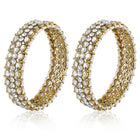 Festive Finish Faux Kundan Pair. Pair of Bangles with white colour kundan stones along with pearls on the edge.