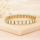 Elegant Kundan-Studded Gold Bangle Set