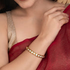 Elegant Kundan-Studded Gold Bangle Set