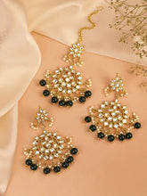 Majestic Glow Earring and Maangtikka. Pair of earrings & Maangtikka, with gold plating, kundan, green beads along with pearls. Buy best selling jewellery from Peora.