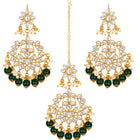 Majestic Glow Earring and Maangtikka. Pair of earrings & Maangtikka, with gold plating, kundan, green beads along with pearls. Buy best selling jewellery from Peora.