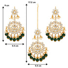 Majestic Glow Earring and Maangtikka. Pair of earrings & Maangtikka, with gold plating, kundan, green beads along with pearls. Buy best selling jewellery from Peora.