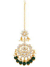 Majestic Glow Earring and Maangtikka. Pair of earrings & Maangtikka, with gold plating, kundan, green beads along with pearls. Buy best selling jewellery from Peora.