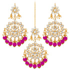 Majestic Glow Earring and Maangtikka. Pair of earrings & Maangtikka, with gold plating, kundan, pink beads along with pearls. Buy best selling jewellery from Peora.