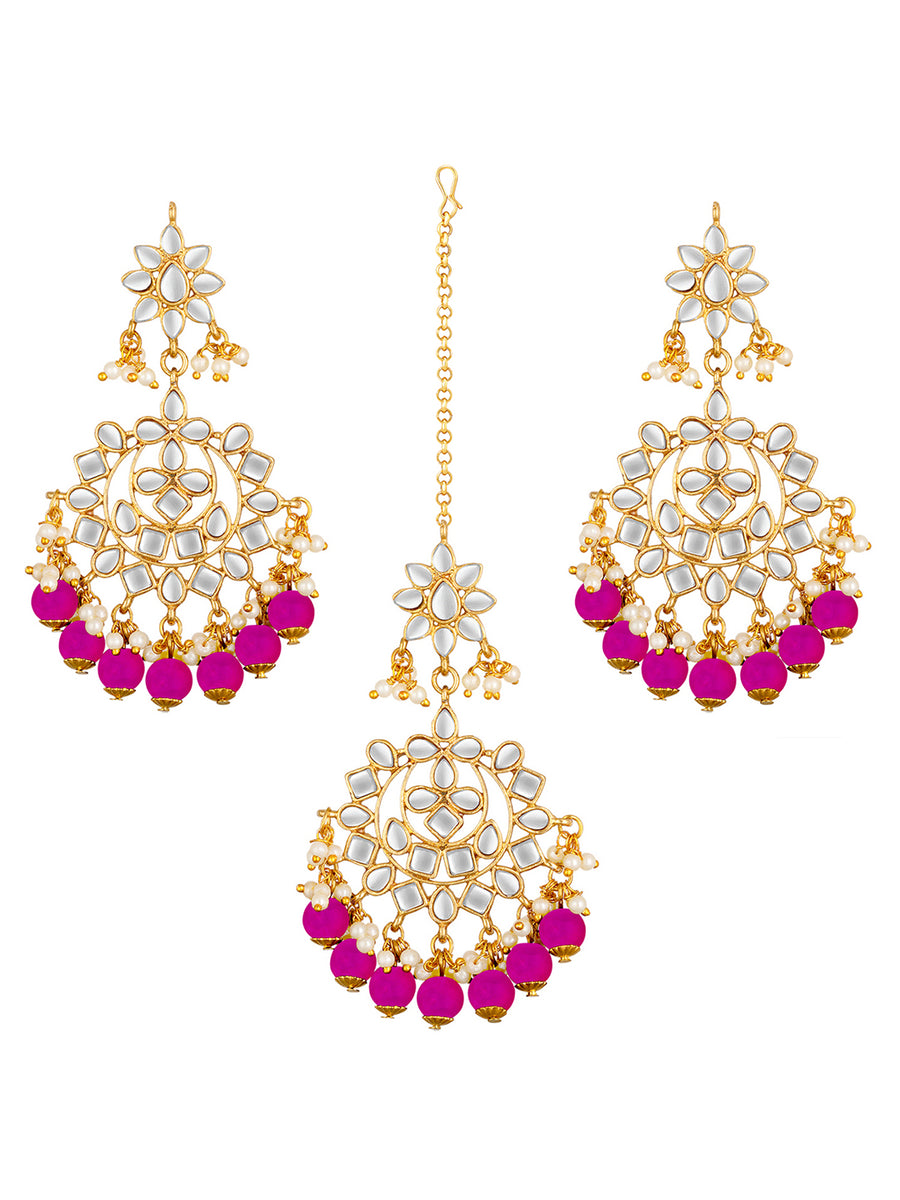 Majestic Glow Earring and Maangtikka. Pair of earrings & Maangtikka, with gold plating, kundan, pink beads along with pearls. Buy best selling jewellery from Peora.