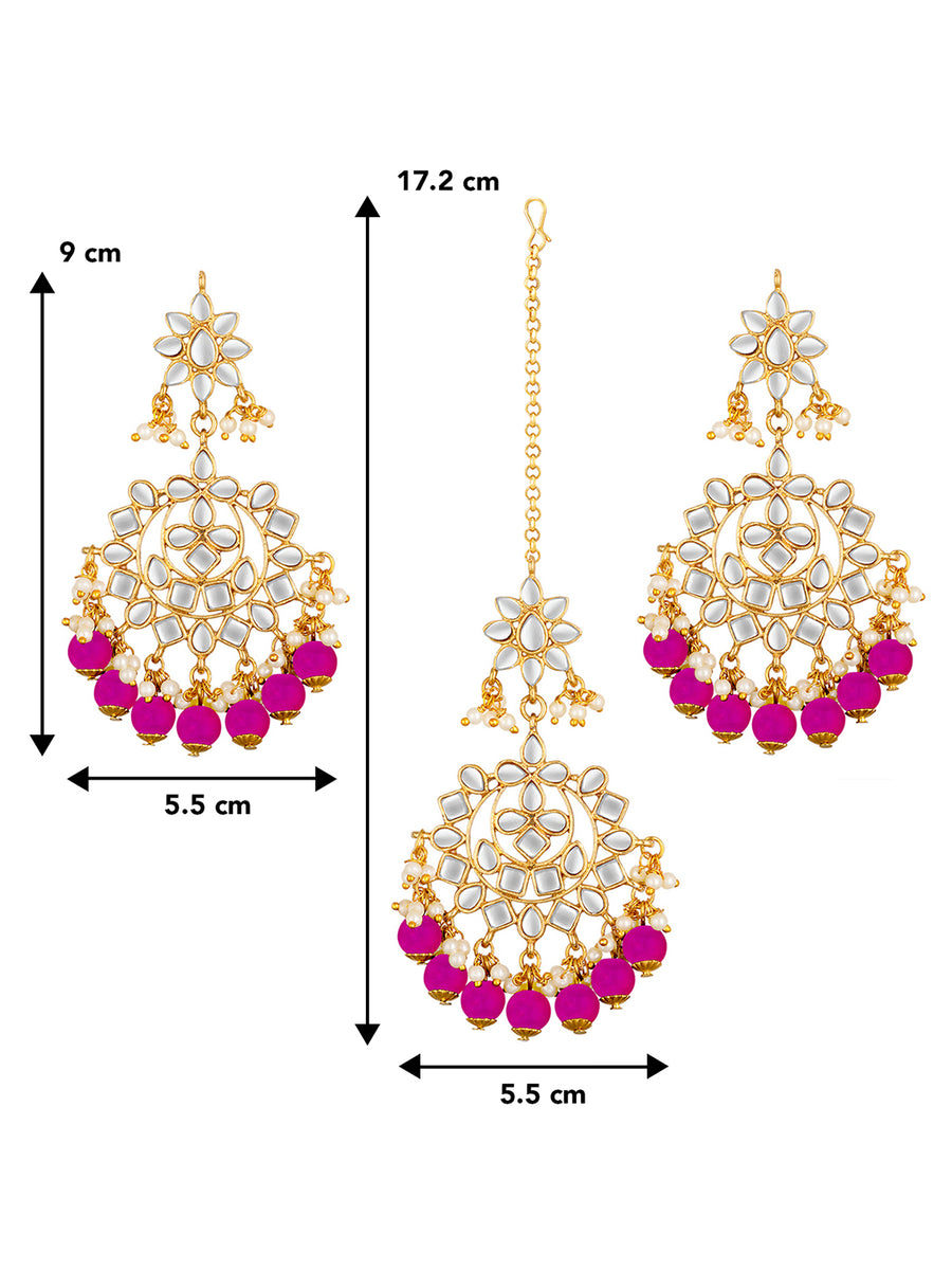 Majestic Glow Earring and Maangtikka. Pair of earrings & Maangtikka, with gold plating, kundan, pink beads along with pearls. Buy best selling jewellery from Peora.