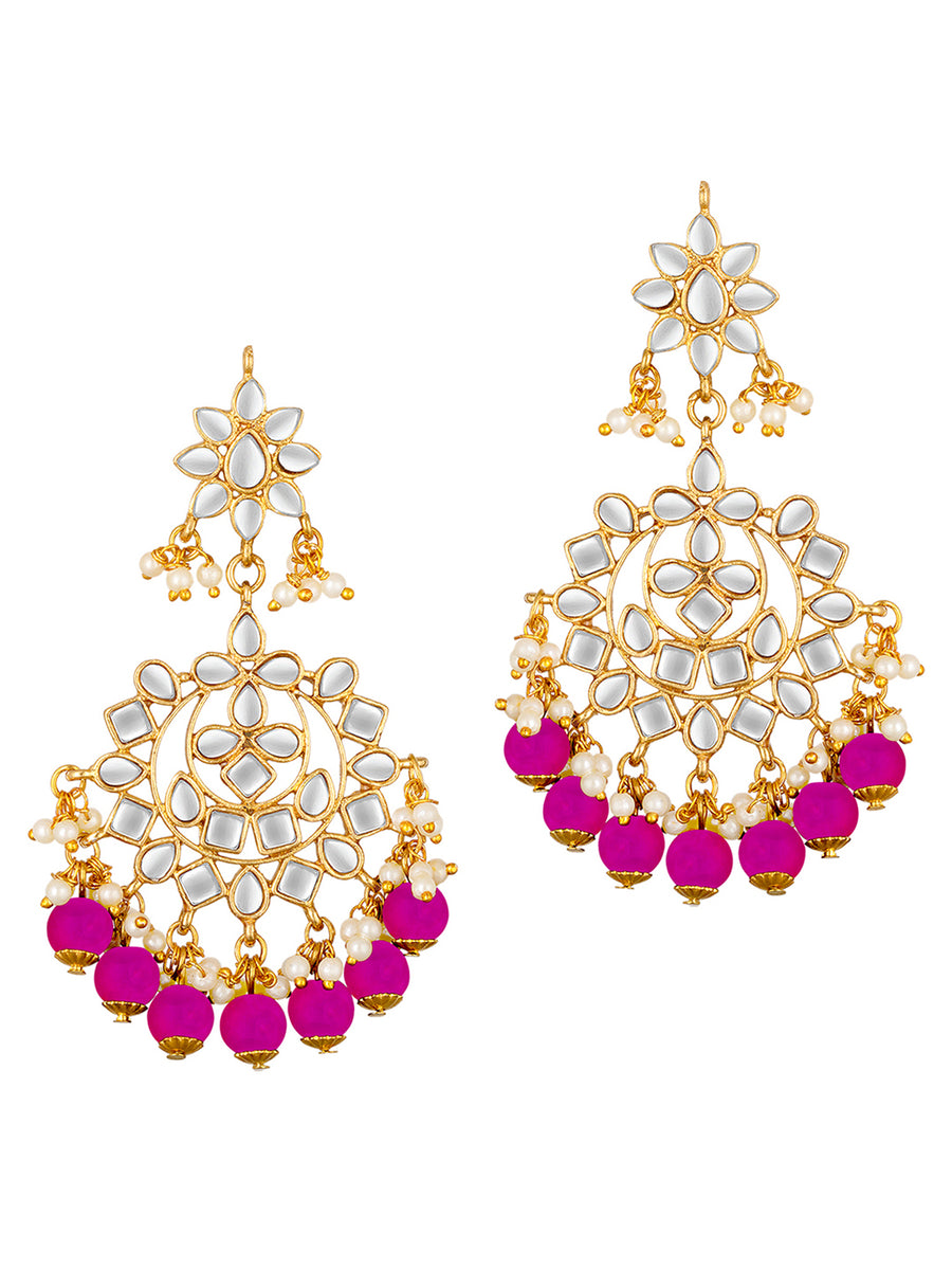 Majestic Glow Earring and Maangtikka. Pair of earrings & Maangtikka, with gold plating, kundan, pink beads along with pearls. Buy best selling jewellery from Peora.