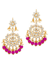 Majestic Glow Earring and Maangtikka. Pair of earrings & Maangtikka, with gold plating, kundan, pink beads along with pearls. Buy best selling jewellery from Peora.