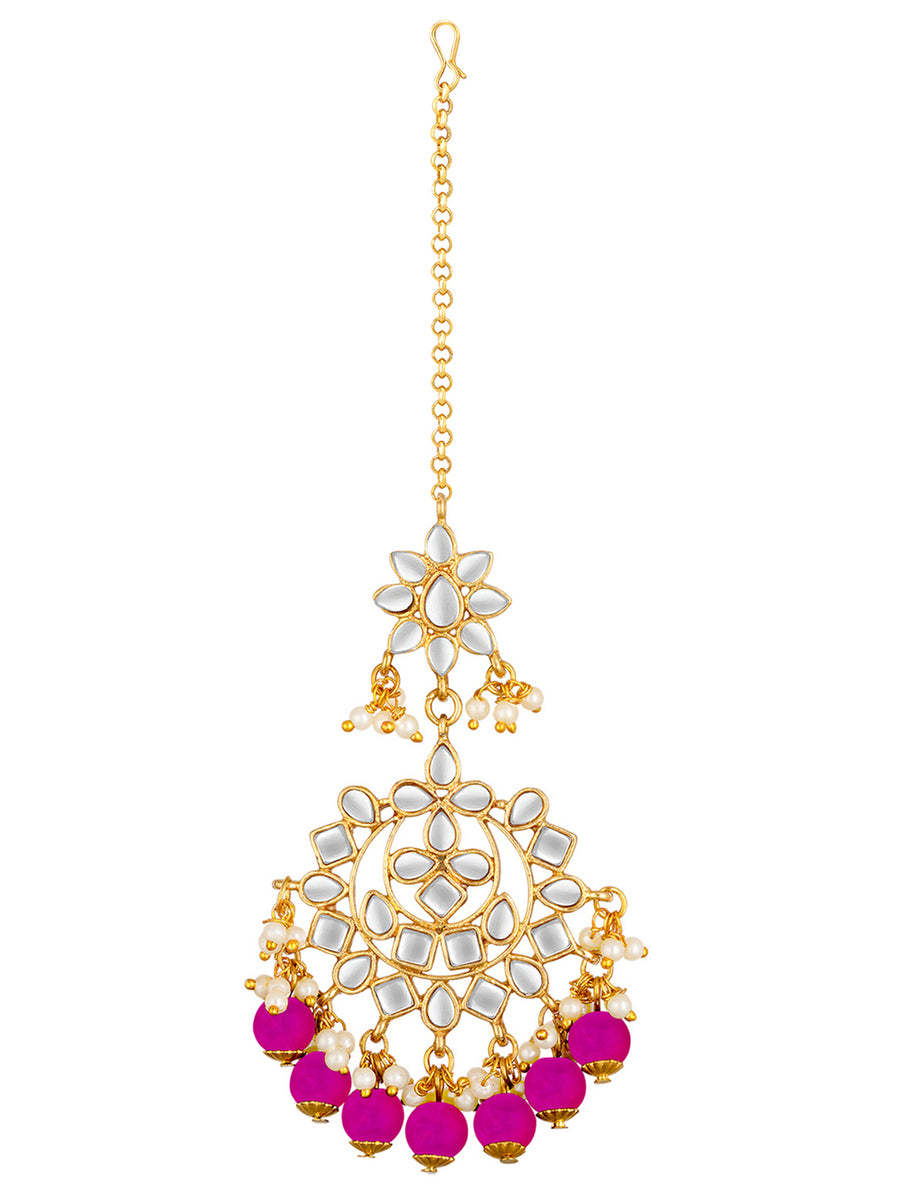 Majestic Glow Earring and Maangtikka. Pair of earrings & Maangtikka, with gold plating, kundan, pink beads along with pearls. Buy best selling jewellery from Peora.
