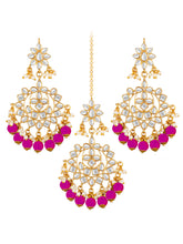Majestic Glow Earring and Maangtikka. Pair of earrings & Maangtikka, with gold plating, kundan, pink beads along with pearls. Buy best selling jewellery from Peora.