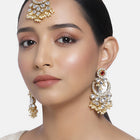 Graceful Lustrous Maang Tikka Set. Pair of earrings & Maangtikka, with gold plating, kundan along with pearls. Buy best selling jewellery from Peora.