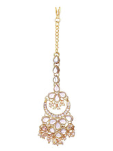 Graceful Lustrous Maang Tikka Set. Pair of earrings & Maangtikka, with gold plating, kundan along with pearls. Buy best selling jewellery from Peora.